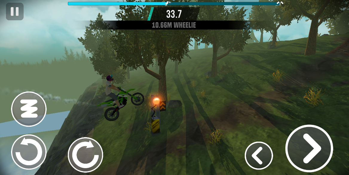 Speeding down a steep slope in a Stunt Bike Extreme forest level